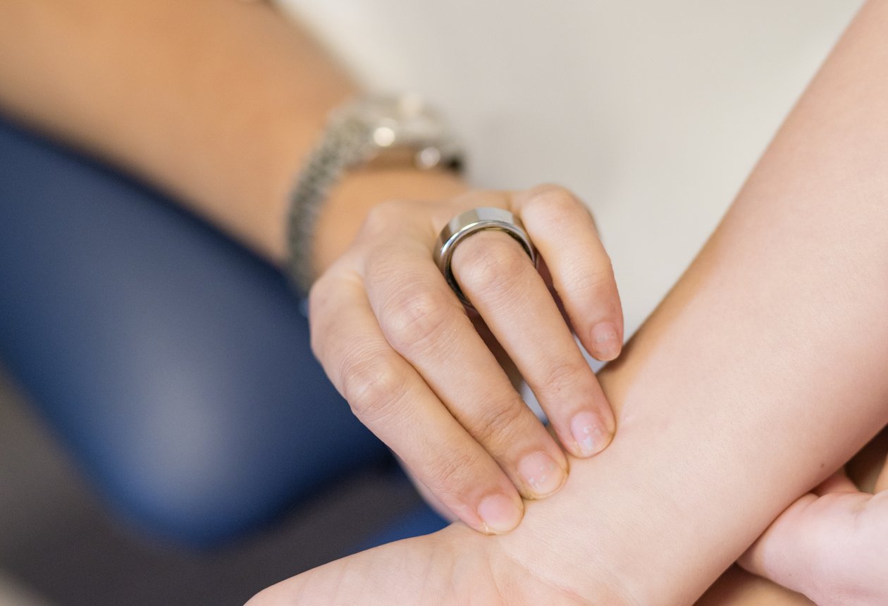 Dr. Radhika Kamat in consultation with a patient